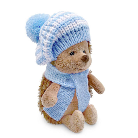 hedgehog soft toy wearing a striped beret and blue scarf, soft plush toy suitable for adults and children.