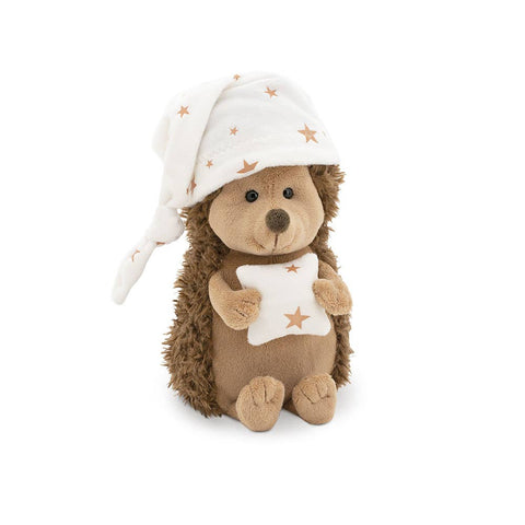 Hedgehog soft toy ready for bedtime wearing is bedtime hat and holding his pillow, soft toy suitable for children.